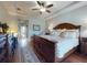 Spacious primary bedroom featuring an elegant tray ceiling and plenty of natural light at 9172 Se 130Th Loop, Summerfield, FL 34491