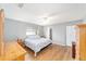 Serene main bedroom with hardwood floors, comfortable furniture, and a peaceful ambiance at 9741 Sw 97Th Ln, Ocala, FL 34481