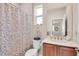 Bathroom featuring a vanity with storage and a shower and tub combo at 9856 Sw 100Th Ter, Ocala, FL 34481