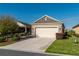 Charming single-Gathering home with a well-maintained lawn, two-car garage, and beautifully landscaped bushes at 9856 Sw 100Th Ter, Ocala, FL 34481