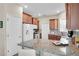 Kitchen featuring granite countertops, stainless steel appliances, and ample cabinet space at 9856 Sw 100Th Ter, Ocala, FL 34481