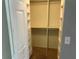 Spacious walk-in closet featuring built-in shelving and drawers for optimal storage at 11014 Sw 73Rd Cir, Ocala, FL 34476