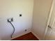 Laundry room setup, featuring hookups on wall and a nearby outlet at 11014 Sw 73Rd Cir, Ocala, FL 34476