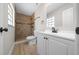 Updated bathroom features tiled shower, modern vanity and fixtures at 341 Se 53Rd Ct, Ocala, FL 34480
