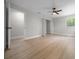 Bright, spacious bedroom with hardwood flooring, ceiling fan, and closet at 341 Se 53Rd Ct, Ocala, FL 34480