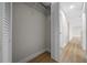 Walk-in closet with ample storage space and wood-look flooring at 341 Se 53Rd Ct, Ocala, FL 34480