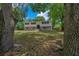 Well-maintained two-story home features a brick facade, symmetrical windows, and a manicured front lawn at 341 Se 53Rd Ct, Ocala, FL 34480