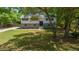 Beautiful home with a lush front yard and a combination of brick and siding exterior at 341 Se 53Rd Ct, Ocala, FL 34480