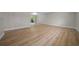 Bright living room with sliding glass door and hardwood floors throughout at 341 Se 53Rd Ct, Ocala, FL 34480