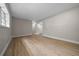 Spacious living room features wood floors and a view of other rooms at 341 Se 53Rd Ct, Ocala, FL 34480
