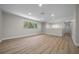 Bright living room featuring hardwood floors, recessed lighting, and natural light at 341 Se 53Rd Ct, Ocala, FL 34480