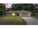 Charming single-story home features a well-manicured lawn and a spacious two-car garage at 5118 Sw 197Th Ter, Dunnellon, FL 34431
