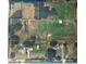 Expansive aerial view of the property showcasing the large lot, landscaping, and surrounding neighborhood streets at 6020 Nw 2Nd Ave, Ocala, FL 34475