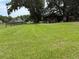 Picturesque land with a shed and mature trees, perfect for rural living at 6020 Nw 2Nd Ave, Ocala, FL 34475