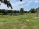 Picturesque land with black fencing and a barn, ideal for equestrian activities at 6020 Nw 2Nd Ave, Ocala, FL 34475
