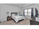 Cozy bedroom with neutral colors, large windows, and comfortable furnishings at 9312 Sw 58Th Cir, Ocala, FL 34476