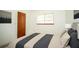 Simple bedroom with wood closet, soft bedding, and natural light at 11128 Sw 75Th Ave, Ocala, FL 34476