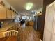 The kitchen has light wood cabinets and countertops with stainless appliances, and an open floorplan to the living room at 9053 Sw 103Rd Ave, Ocala, FL 34481