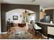 The living room showcases an open design, seamlessly connecting to the kitchen with counter seating at 9053 Sw 103Rd Ave, Ocala, FL 34481