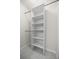 Walk-in closet with built-in shelving for optimal storage and organization at 14390 Sw 30 Pl, Ocala, FL 34481