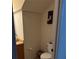 A cozy half bathroom offers a blend of functionality and space-saving design at 4853 Sw 53Rd Rd, Ocala, FL 34474