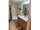 A full bathroom showcasing a vanity, commode, bathtub and shower combination at 4853 Sw 53Rd Rd, Ocala, FL 34474