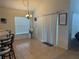 Dining area features tile flooring and sliding doors at 4853 Sw 53Rd Rd, Ocala, FL 34474