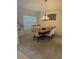 Dining room featuring a window and chandelier-style lighting at 4853 Sw 53Rd Rd, Ocala, FL 34474