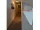 Hallway features neutral walls, recessed lighting, and carpeted floors, connecting various rooms of the home at 4853 Sw 53Rd Rd, Ocala, FL 34474