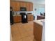 Well-lit kitchen featuring tile floors and lots of cabinet space at 4853 Sw 53Rd Rd, Ocala, FL 34474