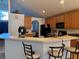 Kitchen featuring breakfast bar, wood cabinets and stainless appliances at 4853 Sw 53Rd Rd, Ocala, FL 34474