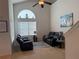 Vaulted living room showcasing large windows and comfortable seating at 4853 Sw 53Rd Rd, Ocala, FL 34474