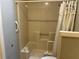Bathroom features functional grab bars, and a shower with a patterned shower curtain at 5024 Se 109Th St, Belleview, FL 34420