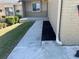 Home's inviting walkway leads to the entrance, complemented by fresh mulch and lush greenery at 5024 Se 109Th St, Belleview, FL 34420