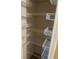 Spacious pantry with wire shelving to keep your dry goods and groceries organized at 5024 Se 109Th St, Belleview, FL 34420