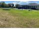 Backyard with grass, a swimming pool, and a gazebo at 5323 Sw 111Th Lane Rd, Ocala, FL 34476