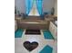 Large bathroom with drop in tub, tile floor and decorative rugs at 5323 Sw 111Th Lane Rd, Ocala, FL 34476