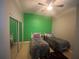 Cozy bedroom with tile flooring and a sliding door closet at 5323 Sw 111Th Lane Rd, Ocala, FL 34476