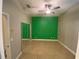 Bedroom featuring a ceiling fan, one accent wall, and mirrored closet doors at 5323 Sw 111Th Lane Rd, Ocala, FL 34476
