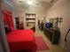 Bright bedroom featuring a comfortable bed, closet, and dresser at 5323 Sw 111Th Lane Rd, Ocala, FL 34476