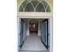 Grand front entrance showcasing decorative glass doors and tiled flooring at 5323 Sw 111Th Lane Rd, Ocala, FL 34476
