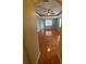 Open living room with tile floors, fan, and natural light at 5323 Sw 111Th Lane Rd, Ocala, FL 34476
