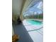 Inviting screened-in pool and patio area perfect for outdoor entertaining and relaxation on sunny days at 5323 Sw 111Th Lane Rd, Ocala, FL 34476
