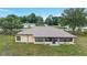 Aerial view of the home showing the spacious backyard and screened porch at 6701 Nw 6Th Ave, Ocala, FL 34475