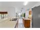 Kitchen with an island, double sink, and stainless steel appliances at 6701 Nw 6Th Ave, Ocala, FL 34475