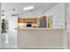 A kitchen with wooden cabinets and a breakfast bar at 6701 Nw 6Th Ave, Ocala, FL 34475