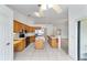 Spacious kitchen with stainless steel appliances, tiled floor, and an island at 6701 Nw 6Th Ave, Ocala, FL 34475