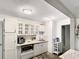 Bright kitchen featuring recessed lighting, stainless appliances, and light gray lower cabinets at 4085 Se 23Rd Ter, Ocala, FL 34480