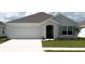 Charming single-story home features a two-car garage and a well-maintained lawn with fresh landscaping at 4731 Sw 88Th Ln, Ocala, FL 34476