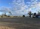 Expansive parcel of land with sparse tree coverage under a bright sky at 8232 Fairways Cir # D101, Ocala, FL 34472